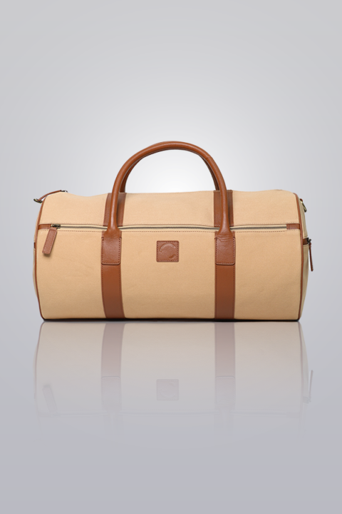 Canvas Weekender - Tan washed canvas duffel bag with leather handles and accents