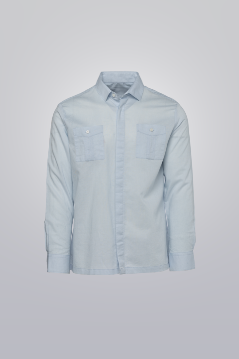 Light blue long sleeve guayabera made from a cotton-linen blend. Sleek design with no pleats and two front pockets.