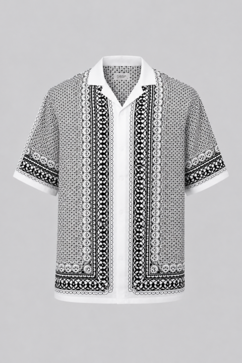 Men's Silk Swim Shirt in black and white geometric print featuring a button-down front, relaxed fit, and premium silk-look fabric.