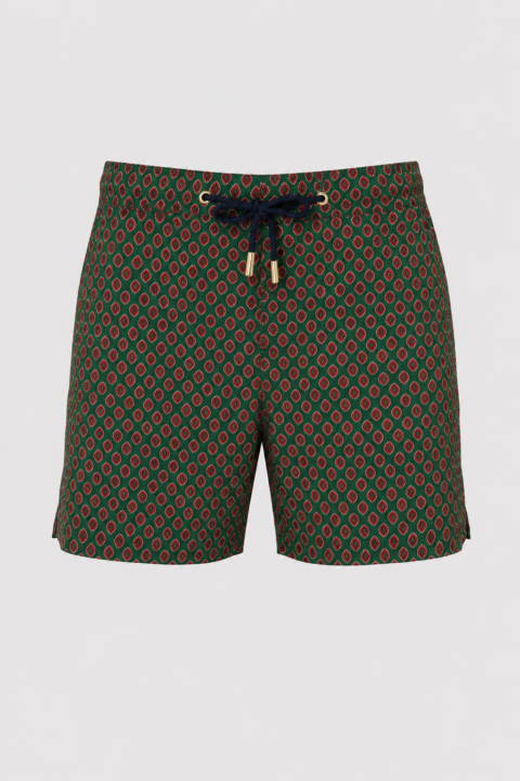 Green and red Signature Tie Silk Swim Short for men featuring a geometric print, navy drawstring with gold metal tips, button closure, and luxury silk fabric.
