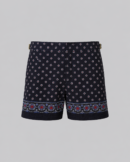 Navy silk swim short for men featuring an all-over geometric print, adjustable side straps, button and zipper closure, metal hardware, zippered back pockets, and mesh lining by Clubman by Leonardo.